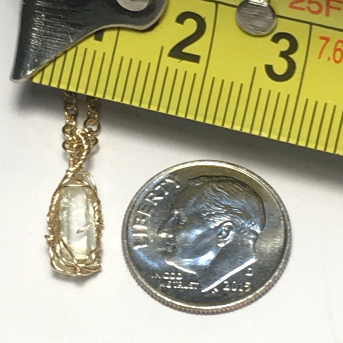 Clear Zincite and Gold Wire Wrap Pendant