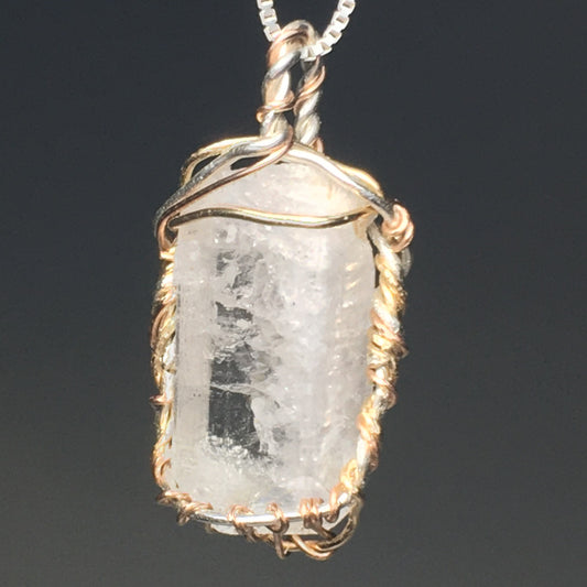 Danburite Crystal on Silver and Gold Pendant
