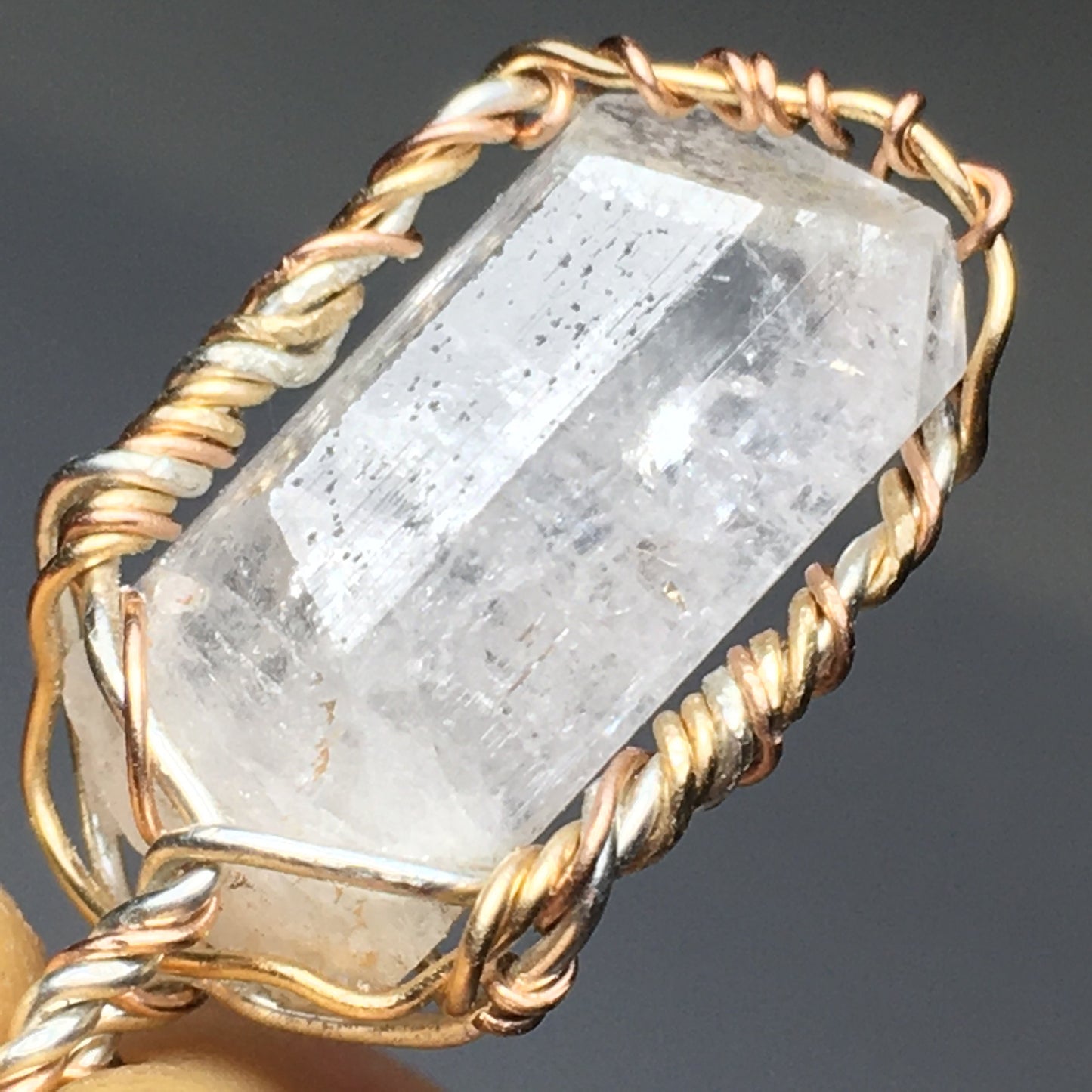Danburite Crystal on Silver and Gold Pendant