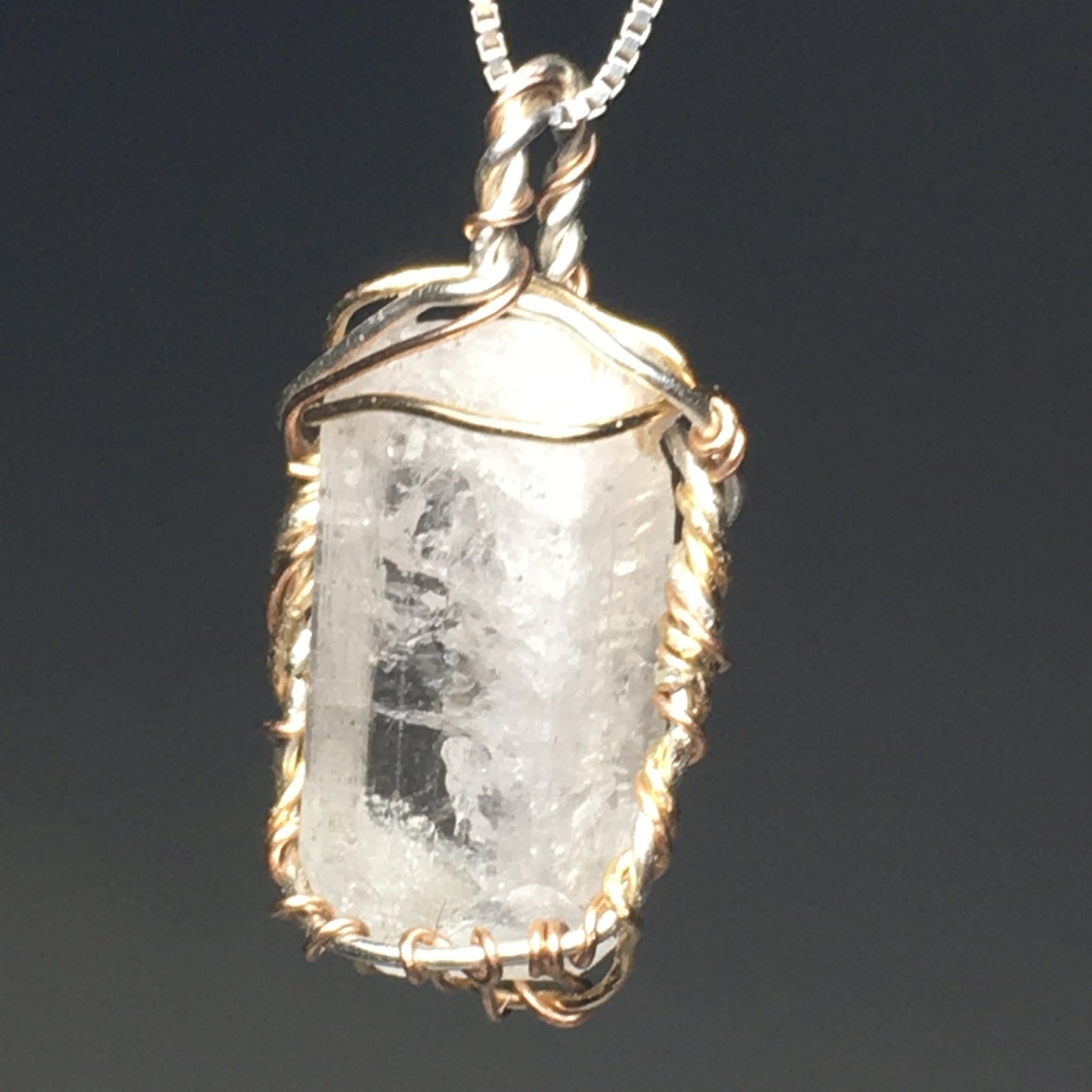 Danburite Crystal on Silver and Gold Pendant